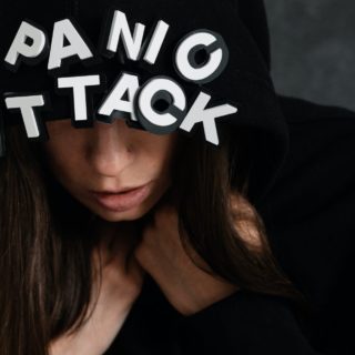 woman wearing a black hoodie